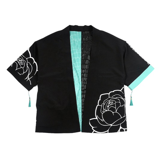 Black and turquoise kimono with white interior and exterior designs and a snake scale finish