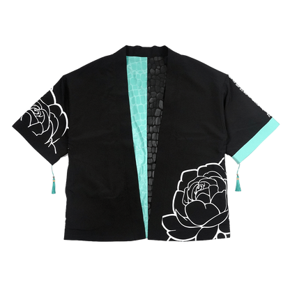 Black and turquoise kimono with white interior and exterior designs and a snake scale finish