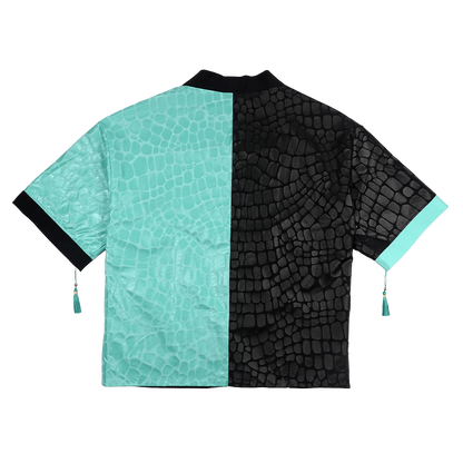 Black and turquoise kimono with white interior and exterior designs and a snake scale finish