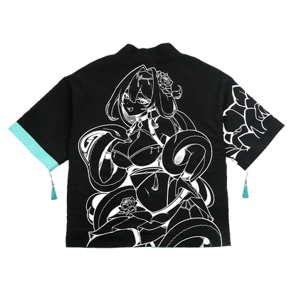 Black and turquoise kimono with white interior and exterior designs and a snake scale finish