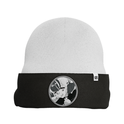 White and black beanie with a folded brim featuring a grayscale anime girl patch on the front.