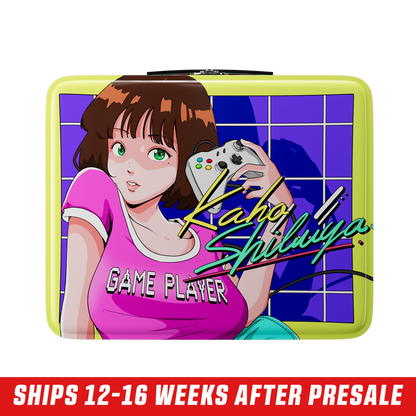 Square lunchbox with retro anime girl in pink shirt holding a game controller on a purple grid background.