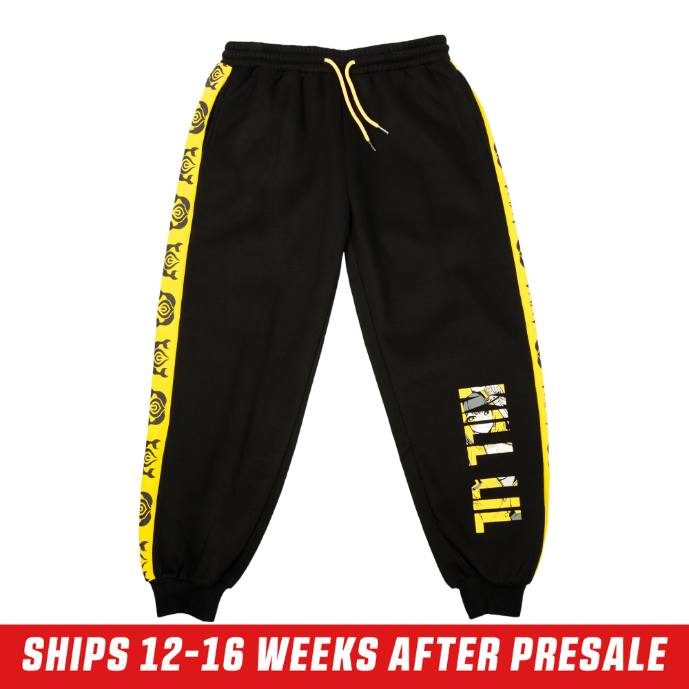 Black sweatpants with bold yellow "KILL LIL" text featuring an anime character graphic inside the letters.