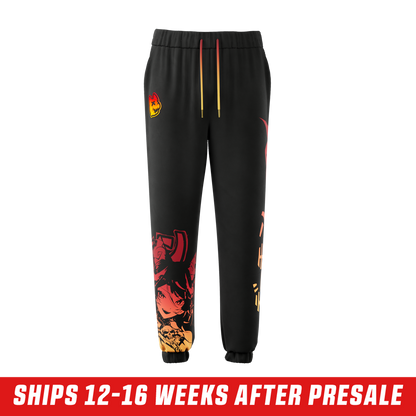 Black sweatpants with elastic cuffs and a red-to-yellow gradient Japanese-style graphic on the leg