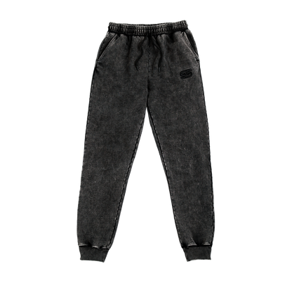 Black stonewash sweatpants with elastic waistband and a single back patch pocket on the right side.