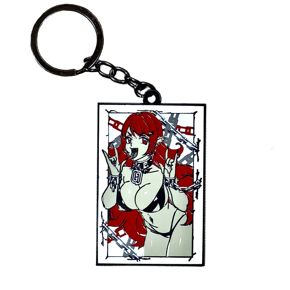 Glow-in-the-dark keychain featuring a silhouetted vampiress with flowing hair and abstract shapes in bright green.